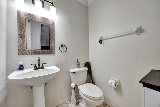 14231 Sonco Ave, Windermere, FL 34786 - half bathroom with toilet, ornamental molding, and baseboards