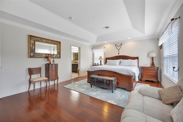 14231 Sonco Ave, Windermere, FL 34786 - bedroom featuring a tray ceiling, ornamental molding, wood finished floors, baseboards, and recessed lighting