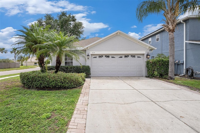 3319 Thistledown Ln, Land O Lakes, FL 34638 - single story home with driveway, an attached garage, stucco siding, and a front lawn