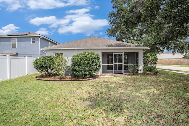 3319 Thistledown Ln, Land O Lakes, FL 34638 - back of property with a sunroom and stucco siding