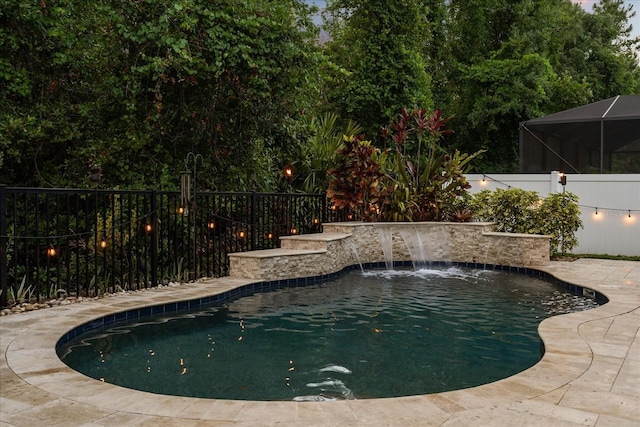 view of swimming pool featuring a fenced in pool and a fenced backyard