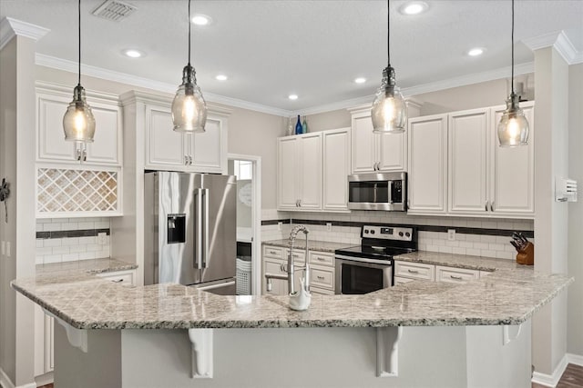 kitchen featuring stainless steel appliances, a breakfast bar area, visible vents, backsplash, and light stone countertops
