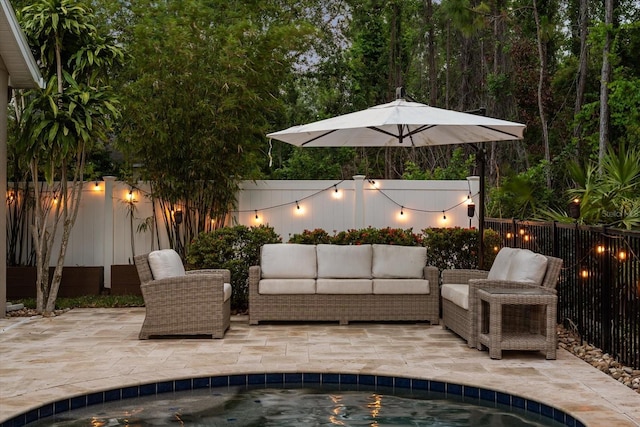 view of patio / terrace featuring a fenced backyard and outdoor lounge area