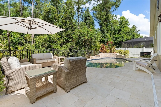 view of patio with an outdoor hangout area and a fenced in pool