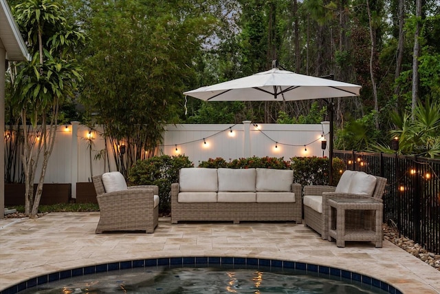 view of patio / terrace with a fenced backyard and an outdoor hangout area