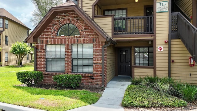 315 Lakepointe Dr Unit 101, Altamonte Springs, FL 32701 - entrance to property with brick siding and a balcony