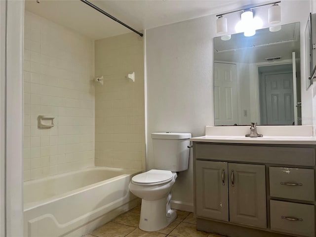 315 Lakepointe Dr Unit 101, Altamonte Springs, FL 32701 - full bath with tile patterned floors, toilet, vanity, and tub / shower combination