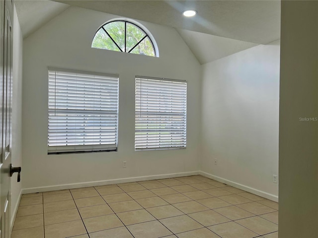 315 Lakepointe Dr Unit 101, Altamonte Springs, FL 32701 - spare room with vaulted ceiling, light tile patterned floors, baseboards, and recessed lighting