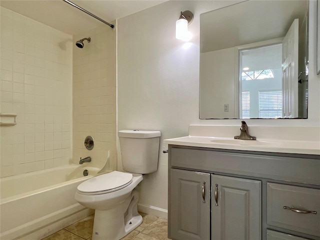 315 Lakepointe Dr Unit 101, Altamonte Springs, FL 32701 - bathroom with tile patterned flooring, toilet, vanity, tub / shower combination, and baseboards