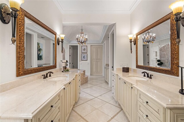 5909 Oxford Moor Blvd, Windermere, FL 34786 - bathroom featuring a chandelier, tile patterned floors, two vanities, and ornamental molding
