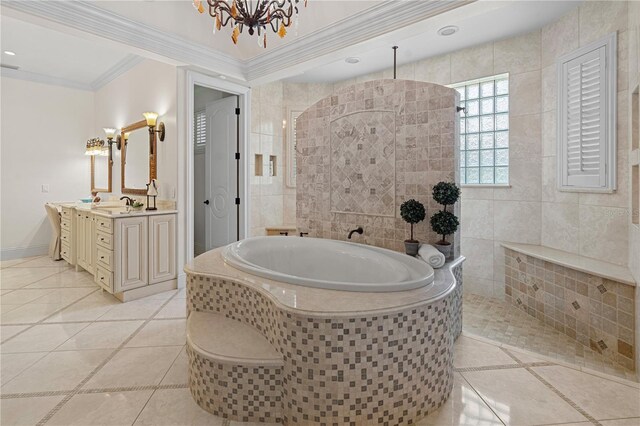 5909 Oxford Moor Blvd, Windermere, FL 34786 - bathroom with a garden tub, tile patterned floors, crown molding, a walk in shower, and vanity