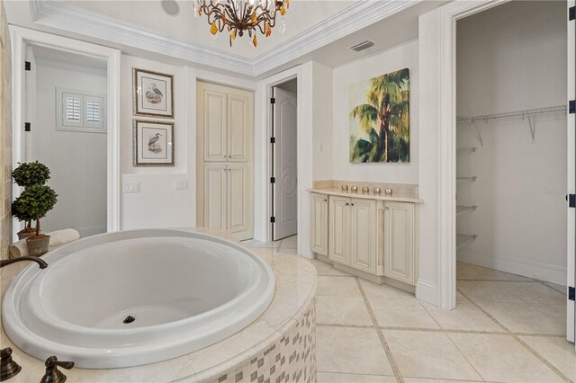 5909 Oxford Moor Blvd, Windermere, FL 34786 - bathroom with a chandelier, a bath, and baseboards