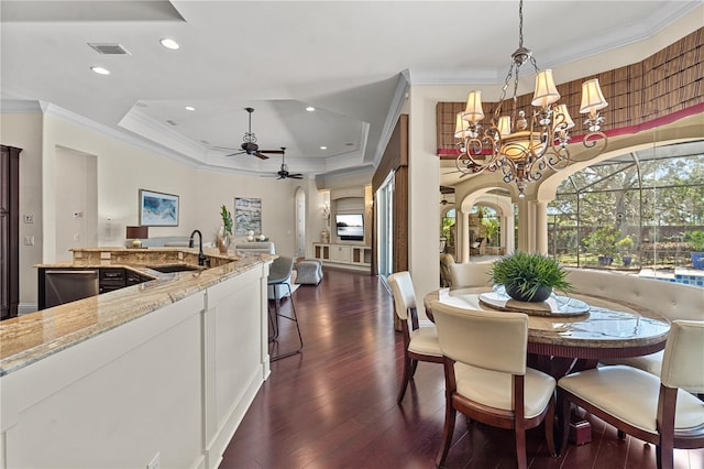 5909 Oxford Moor Blvd, Windermere, FL 34786 - dining room featuring ornamental molding, ceiling fan, dark wood-style floors, recessed lighting, and a chandelier