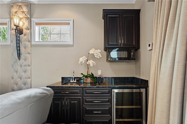 5909 Oxford Moor Blvd, Windermere, FL 34786 - full bathroom with wine cooler and vanity