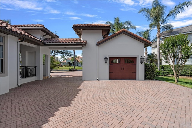 5909 Oxford Moor Blvd, Windermere, FL 34786 - garage with decorative driveway