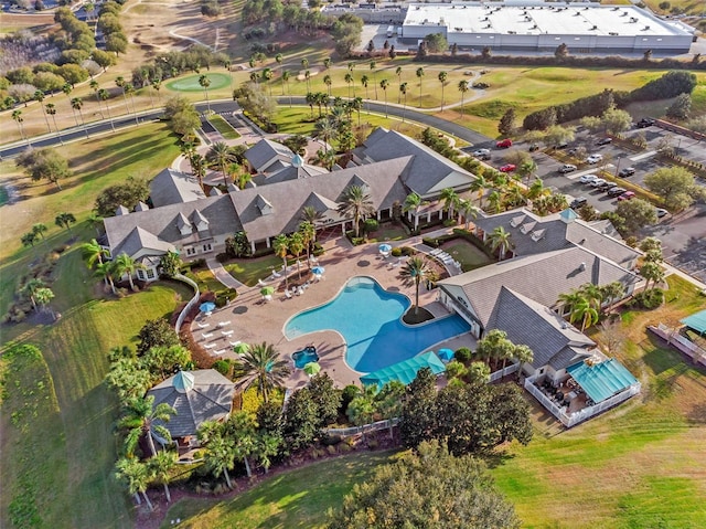 view of property location featuring a pool area