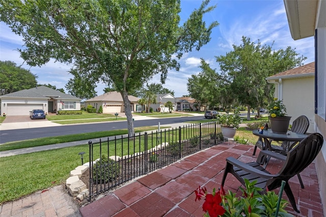 view of patio / terrace with a residential view