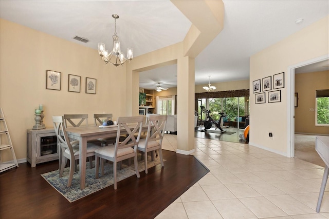 1428 Lucky Pennie Way, Apopka, FL 32712 - dining area featuring a chandelier, baseboards, and tile patterned floors