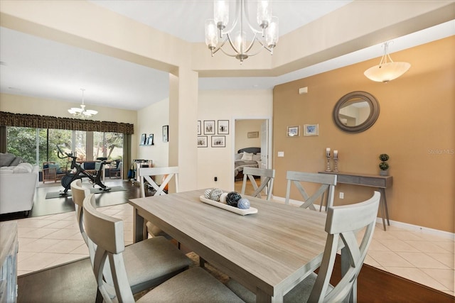 1428 Lucky Pennie Way, Apopka, FL 32712 - dining area with a chandelier, tile patterned flooring, and baseboards