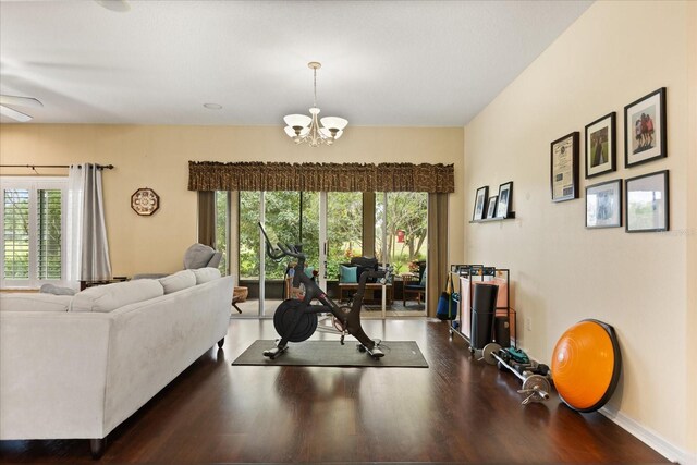 1428 Lucky Pennie Way, Apopka, FL 32712 - living area with a chandelier, wood finished floors, healthy amount of natural light, and a ceiling fan