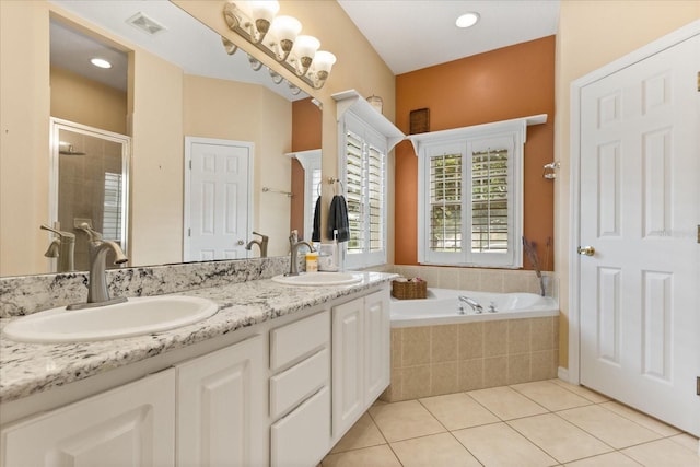 1428 Lucky Pennie Way, Apopka, FL 32712 - bathroom with double vanity, tile patterned flooring, a bath, and a stall shower