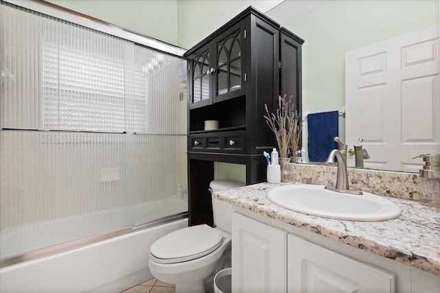 1428 Lucky Pennie Way, Apopka, FL 32712 - full bath featuring vanity, toilet, enclosed tub / shower combo, and tile patterned flooring
