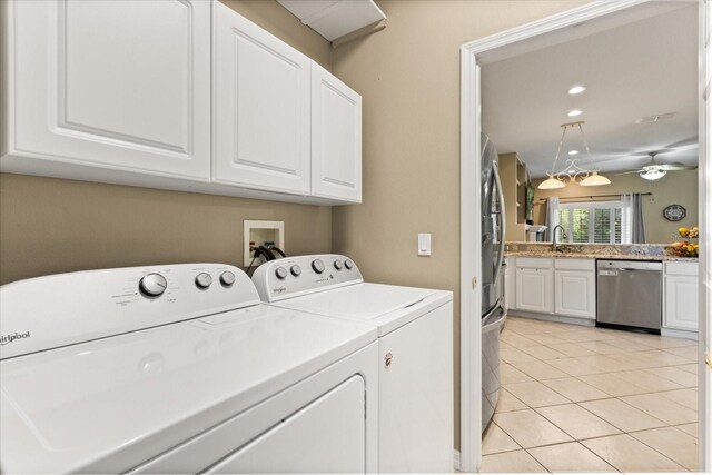 1428 Lucky Pennie Way, Apopka, FL 32712 - laundry area featuring washing machine and dryer, light tile patterned floors, a sink, and recessed lighting