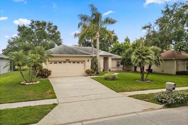 1428 Lucky Pennie Way, Apopka, FL 32712 - single story home with a garage, stucco siding, a front lawn, and concrete driveway