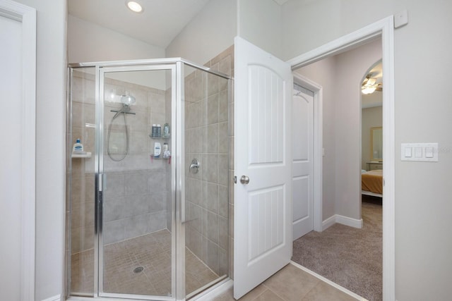 full bath with a stall shower, ensuite bath, baseboards, tile patterned floors, and recessed lighting