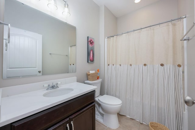 full bathroom featuring vanity, toilet, tile patterned flooring, and curtained shower
