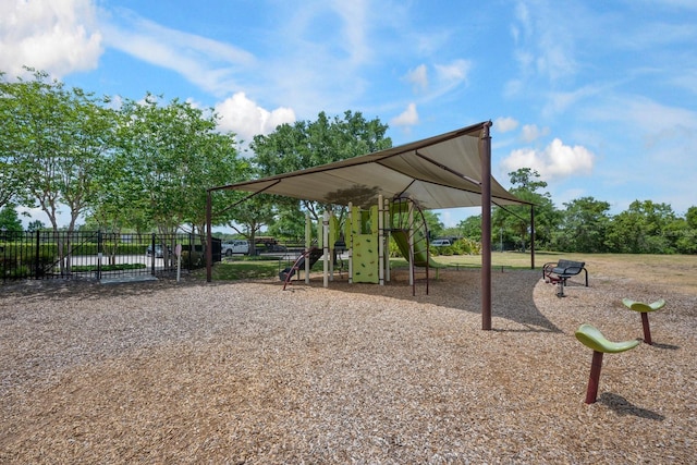 view of community with fence