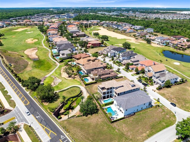 300 Muirfield Loop, Reunion, FL 34747 - aerial overview of property's location with a local golf course, nearby suburban area, a nearby body of water, and a pool area