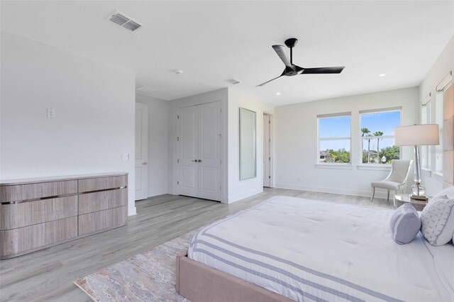 300 Muirfield Loop, Reunion, FL 34747 - bedroom featuring light wood-style floors, baseboards, ceiling fan, and recessed lighting