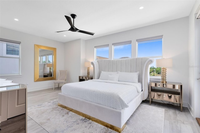 300 Muirfield Loop, Reunion, FL 34747 - bedroom featuring wood finished floors, baseboards, recessed lighting, and ceiling fan