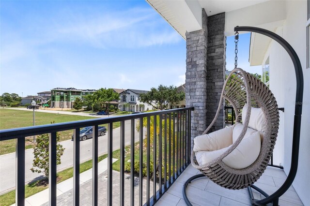 300 Muirfield Loop, Reunion, FL 34747 - balcony featuring a residential view