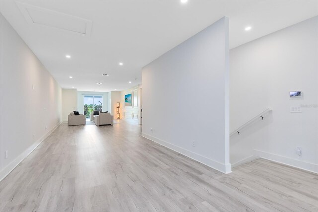 300 Muirfield Loop, Reunion, FL 34747 - hallway with light wood-type flooring, recessed lighting, and baseboards