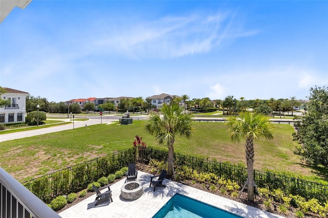 300 Muirfield Loop, Reunion, FL 34747 - view of yard with a fire pit and a patio area
