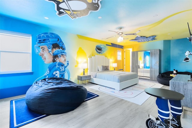 300 Muirfield Loop, Reunion, FL 34747 - bedroom with wood finished floors, recessed lighting, and a ceiling fan