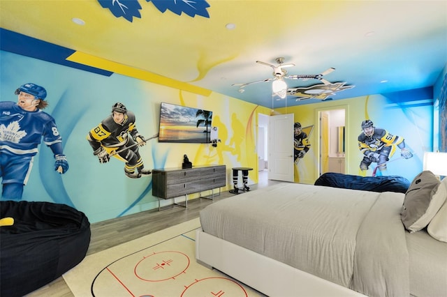 300 Muirfield Loop, Reunion, FL 34747 - bedroom featuring wood finished floors and ceiling fan