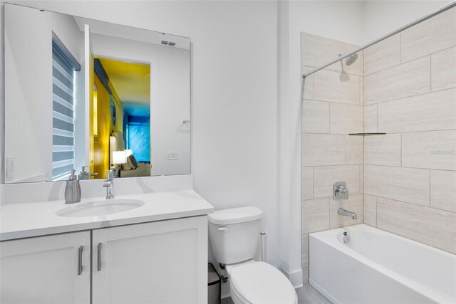 300 Muirfield Loop, Reunion, FL 34747 - full bathroom with vanity, toilet, and shower / washtub combination