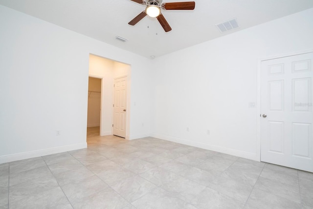 15998 SW 33rd Avenue Rd, Ocala, FL 34473 - empty room featuring ceiling fan, baseboards, and visible vents