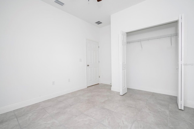 15998 SW 33rd Avenue Rd, Ocala, FL 34473 - unfurnished bedroom featuring a closet, visible vents, baseboards, and ceiling fan