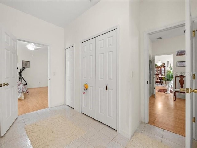 foyer entrance featuring light tile patterned floors