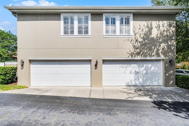 garage with driveway