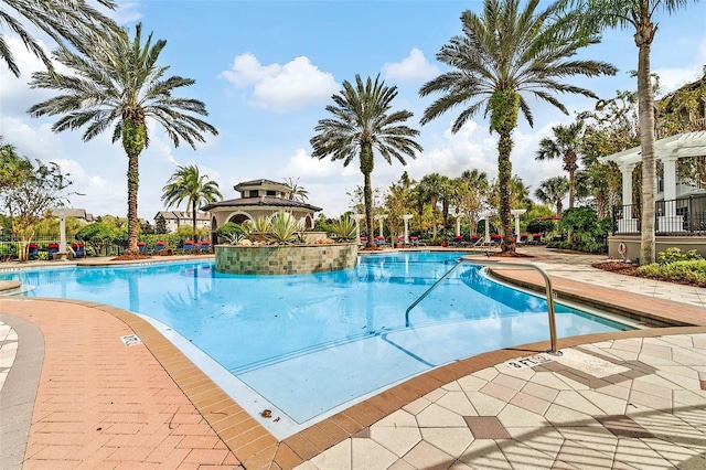 community pool with a patio