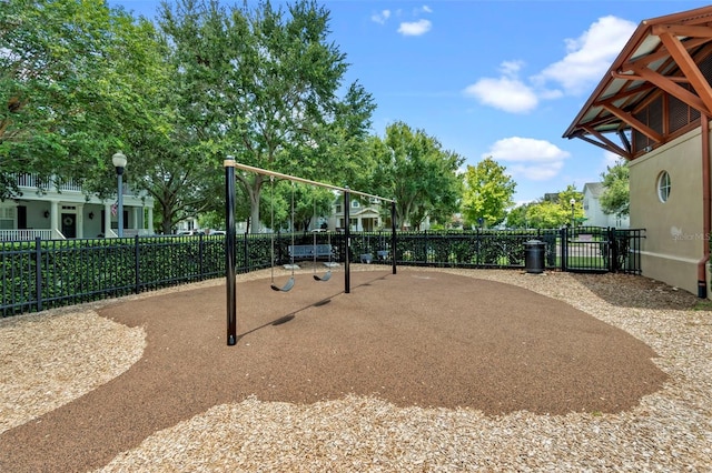 view of community with fence