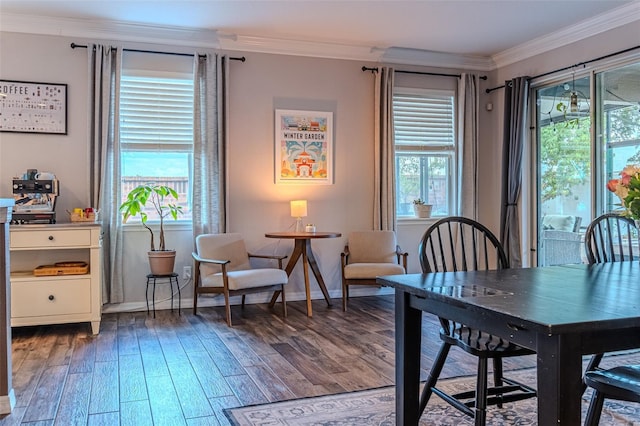 459 Millwood Pl, Winter Garden, FL 34787 - dining area featuring baseboards, wood-type flooring, and crown molding