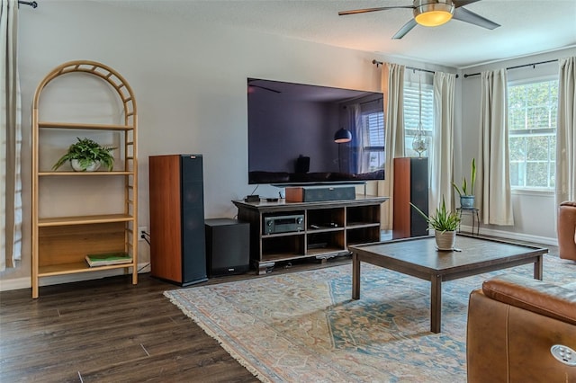 459 Millwood Pl, Winter Garden, FL 34787 - living area featuring baseboards, dark wood-type flooring, and a ceiling fan