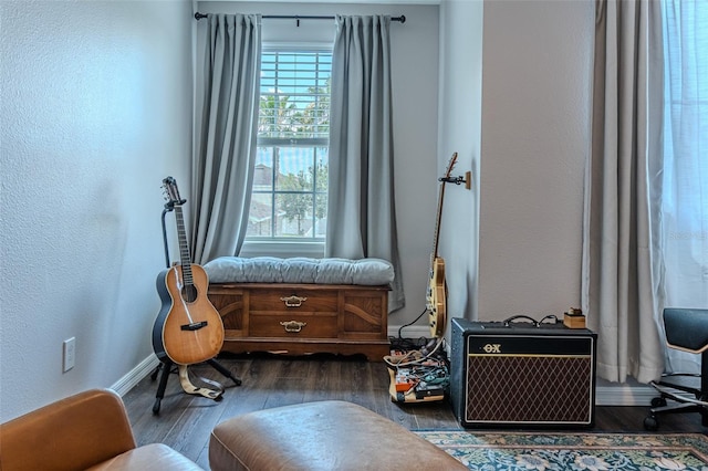 459 Millwood Pl, Winter Garden, FL 34787 - living area featuring a textured wall, baseboards, and wood finished floors