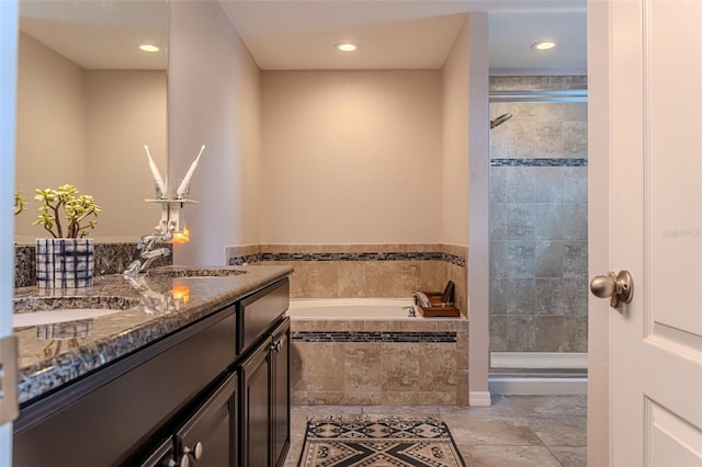 459 Millwood Pl, Winter Garden, FL 34787 - bathroom featuring a stall shower, vanity, recessed lighting, and a bath
